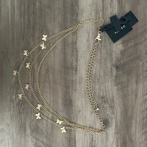 Gold butterflies belt.  Never used.